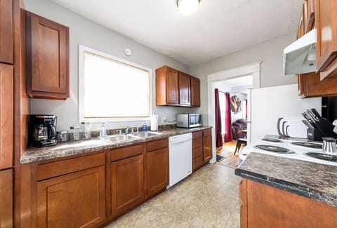 Laundry Room is located to the right along with the back door.