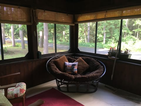 Porch nest has bamboo privacy blinds