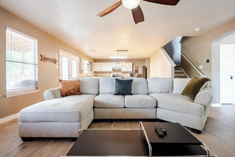 Spacious Living room with 65'' TV, perfect for enjoying your favorite game/show.