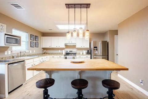 Large kitchen stocked with kitchenware.  Includes complimentary coffee and tea. 