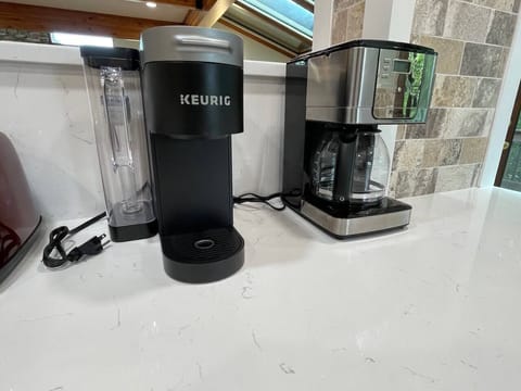 Fully stocked kitchen with drip and keurig coffee makers