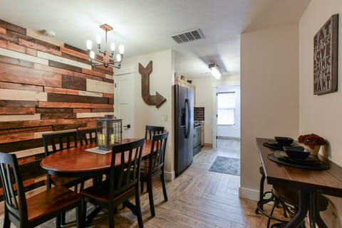 Dining area in unit 4 looking into the kitchen