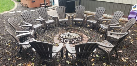 Chat w/ family & friends around a campfire. Wood & roasting  sticks provided