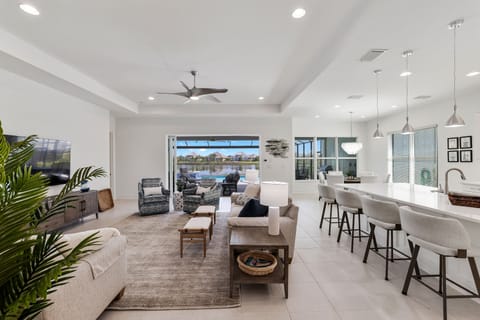 Bright, airy, spacious gathering space for family & friends with a coastal feel.