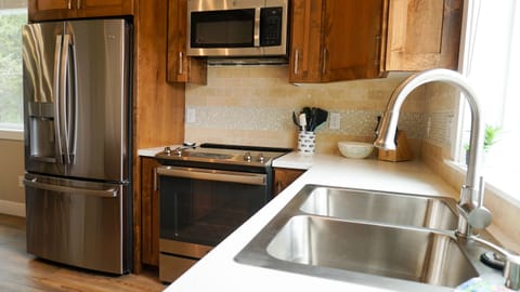 Our kitchen has brand-new stainelss steel appliances. 