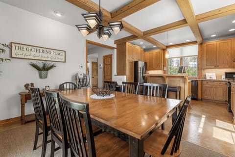 Large dining room table with seating for 8