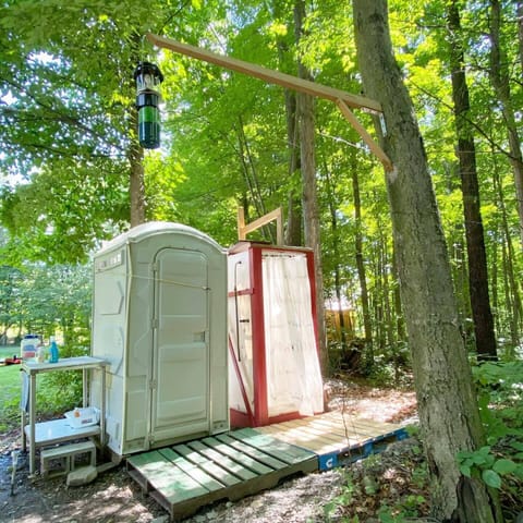 Private privy and solar shower outside the Achsah yurt. 
