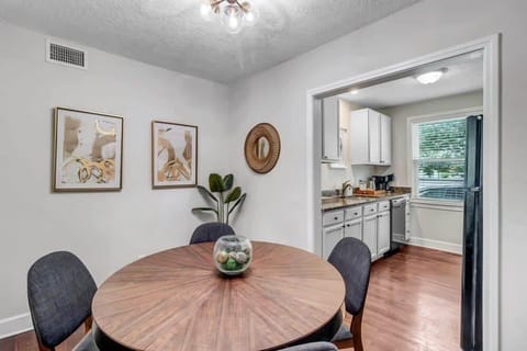 Separate dining space with space for gathering for meals or games.