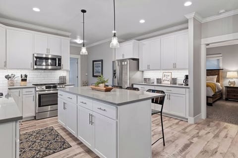 Kitchen- Coffee bar fully stocked with coffee, creamer, sugar and more. 