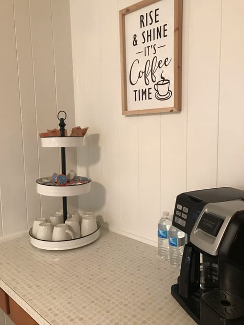 Mini coffee bar. Kpods, enough ground coffee for a couple pots and some creamer