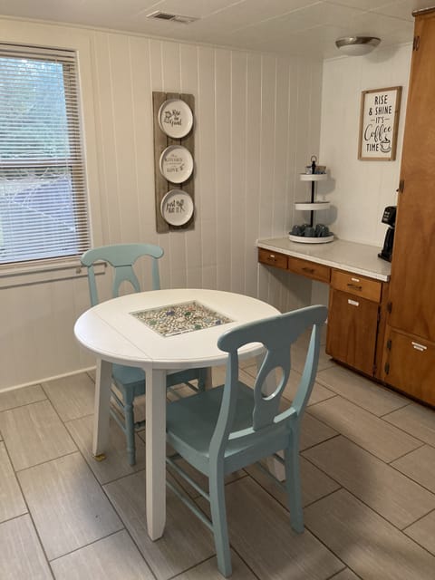 Dinette in kitchen with mini coffee bar. We provide kpods and some ground coffee