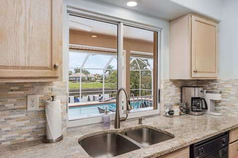 Watch what is going outside from this kitchen view