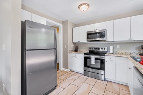 Full Kitchen stocked with plenty of cookware, silverware and dinnerware