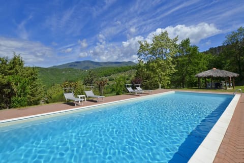 Beautiful villa with private pool, terrace, and garden with countryside views