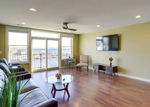 Spacious Living Room Overlooking Water and Boats