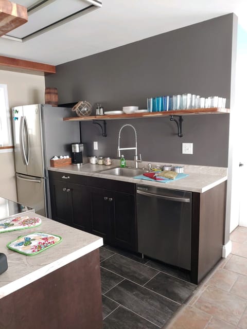 This suite has a full size kitchen.  