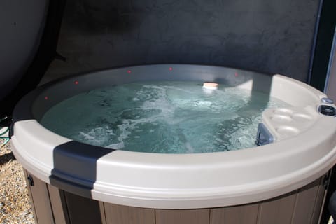 Climb on in and enjoy! Hot tub to relax on your vacation in the mountains.