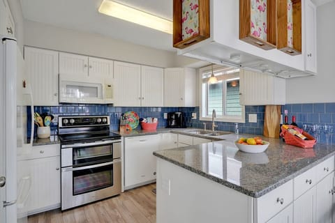 Upstairs Kitchen has Double Oven, Dishwasher, Microwave, Garbage Disposal