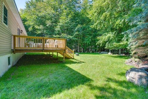 Ample size backyard with fire pit