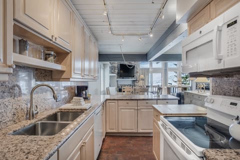 Full kitchen with granite countertops