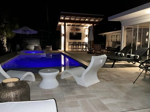 New Covered Pool Bar with granite bar seats 8,  75" TV for sports, movies, news