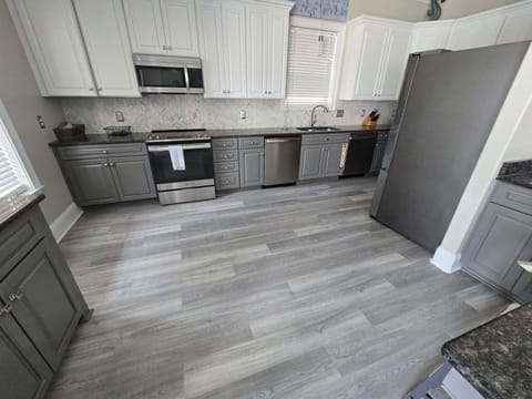 Large Kitchen, lots of working space. 2 dishwashers for easy cleanup.