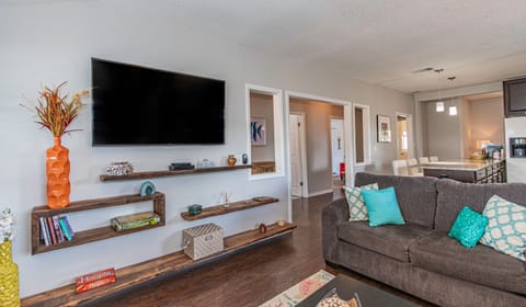 Living Room / Hall / 58" smart TV with cable and streaming