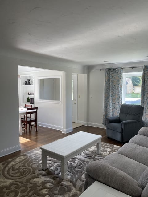 Living room - The living room flows naturally into the dining area and kitchen