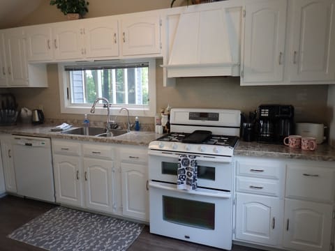 Full kitchen with utensils, cook & bake ware, crock pot, instant pot.