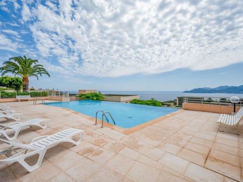 Cloud, Water, Sky, Swimming Pool, Plant, Azure, Seaside Resort, Outdoor Furniture, Coastal And Oceanic Landforms, Tree