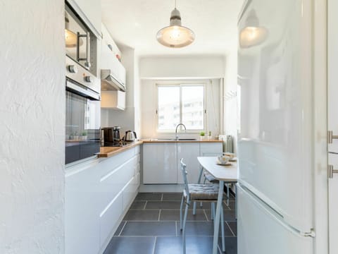 Cabinetry, Property, Countertop, Furniture, Window, Sink, Kitchen, Lighting, Wood