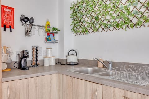 The apartment features a well-equipped kitchen complete with a fridge freezer, dishwasher, microwave, oven, hob, kettle, coffee machine and toaster.  It's the perfect place to make a home-cooked meal.