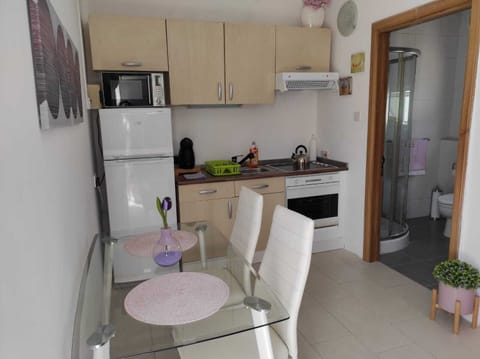 Fully functional kitchen with coffee machine. 