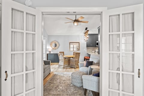 View of great room/kitchen from bedroom.