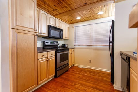 Fully stocked kitchen includes appliances, cookware and utensils
