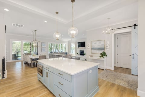 Open floor plan with open kitchen, living, dining areas great for entertaining