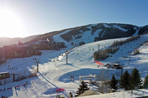 Winter magic starts here – your mountain escape awaits at the base of First Time Lift- please note this photo is an aerial view of the lifts that are right outside the Snowflower ski locker room door