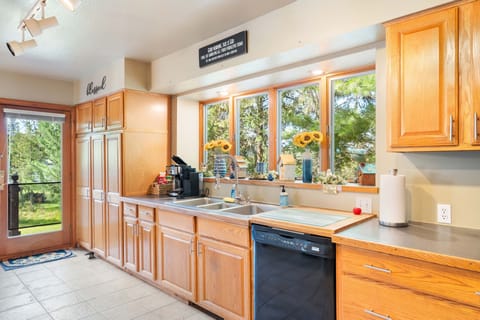 The kitchen has an exit door to the spacious deck.