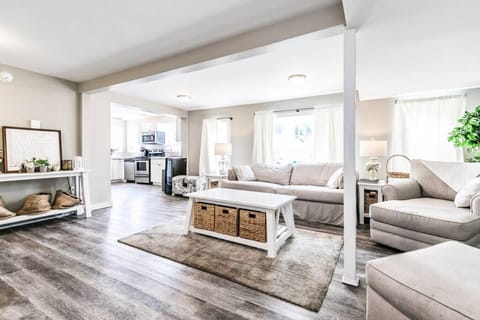 A cozy living room with a fireplace and a flat screen TV, perfect for relaxing.