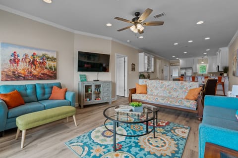 Den is open to the kitchen and the dining area