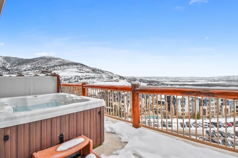Private hot tub with mountain views.