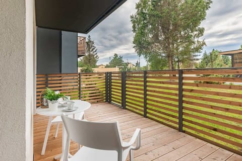 The terrace's stylish design complements the apartment's decor. 