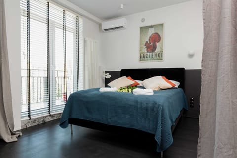 The living area's elegant color palette creates a cheerful and inviting atmosphere.