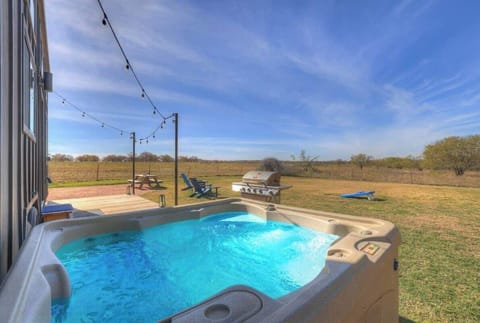 Grab your favorite beverage while you relax in the hot tub!
