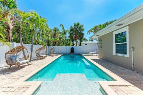 Large heated pool with tanning deck and spa