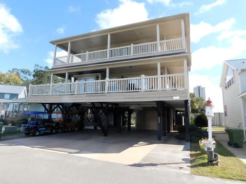 Spacious three-story home with expansive covered balconies