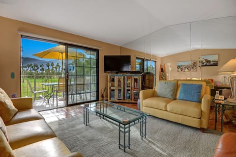 Spacious Living Room with TV
