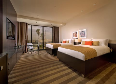 Unit with 2 Queen beds. Exact unit will be assigned upon arrival. Views, colors, and decor may vary.