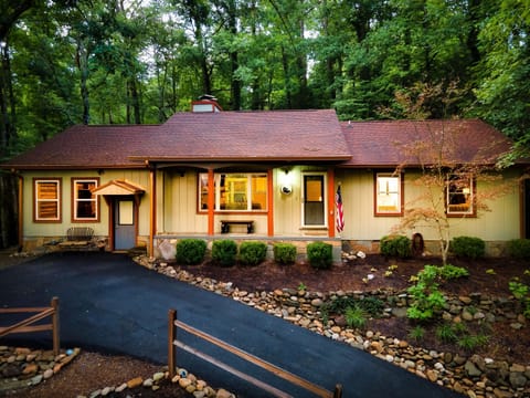 The sloped driveway leads you up to the beautiful property on the Hillside!
