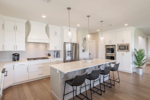 Kitchen Island View - The Kitchen Island comfortably seats 4 adults and creates a great space for serving and preparing meals.